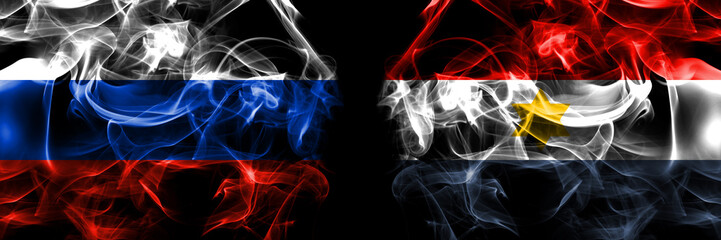 Russia, Russian vs Myanmar, Chin National Army flags. Smoke flag placed side by side isolated on black background