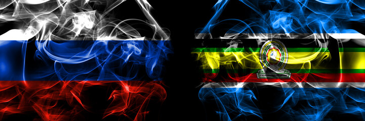 Russia, Russian vs Organizations, East African Community flags. Smoke flag placed side by side isolated on black background