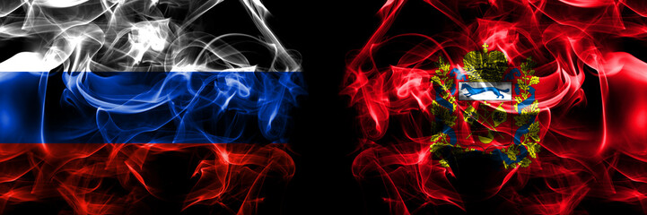 Russia, Russian vs Russia, Russian, Orenburg Oblast flags. Smoke flag placed side by side isolated on black background