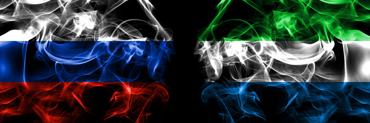 Russia, Russian vs Sierra Leone flags. Smoke flag placed side by side isolated on black background