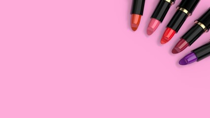 Lipsticks in black cases on pink background. Lots of space for copy. Fashionable lipsticks in glossy black cases against pink background