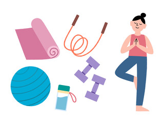 A young woman practicing yoga in a standing position with workout equipment set. healthy lifestyle concept.