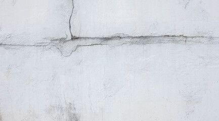 large cracked concrete wall surface