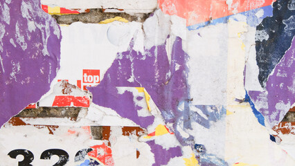 Torn and weathered street poster background. Abstract colorful paper texture