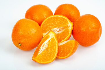 Large ripe sweet tangerines isolated on white background. Studio Photo