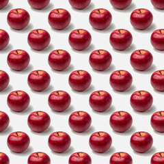seamless pattern of red apples on a white background