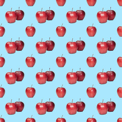 seamless pattern of red apples on a blue background
