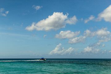 A scenic view of the sea with the puffy clouds in the sky in Glitter Bay, Barbados, Caribbean