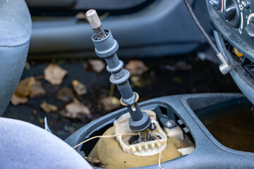 A damaged gear lever in a car wreck