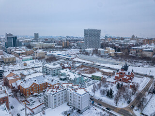 View of the center of Kazan from above. High-rise buildings, churches and historic buildings. Winter View
