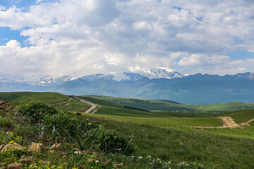 Fototapeta premium The high-mountain road to the tract of Jily-Su. Caucasus. Kabardino-Balkaria. Russia.