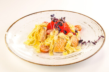 Italian pasta with salmon and caviar