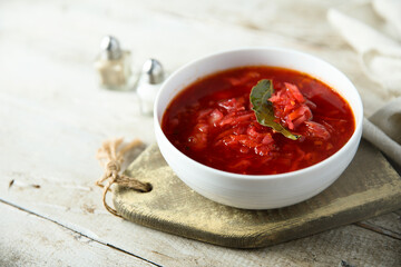 Traditional homemade beetroot soup with bay leaf