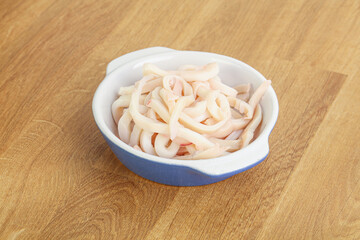 Marinated squid strips in the bowl