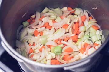 Preparation of a fresh vegetable soup.