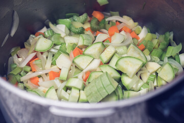 Preparation of a fresh vegetable soup.