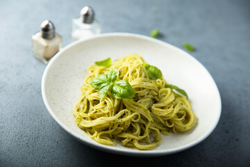Traditional spaghetti with pesto sauce