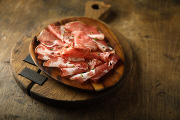 Delicious sliced smoked ham on a desk