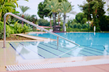 Outdoor hotel swimming pool.