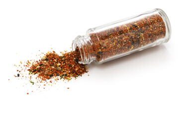 Shichimi Togarashi (aromatic spices that are indispensable for Japanese cuisine)spilled from the bottle.
A mixture of dried chili pepper and other seasonings. This is homemade. - obrazy, fototapety, plakaty
