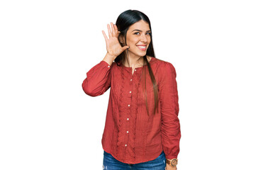 Young hispanic woman wearing casual clothes smiling with hand over ear listening an hearing to rumor or gossip. deafness concept.