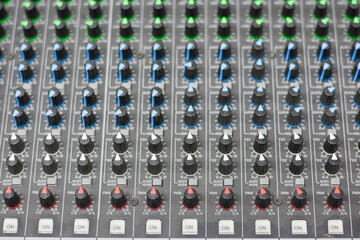 Mix audio for conferences with lots of buttons.