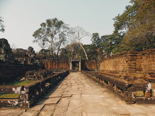 Ruins of an ancient stone temple lost in the Cambodian jungle - Preah Palilay of Angkor temples
