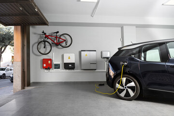 Particular Electric Vehicle Charging Station at home. - obrazy, fototapety, plakaty