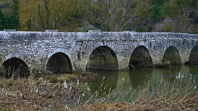 Roman bridge with 13 arches on the river Zadorra in Trespuentes. Municipality of Iruña de Oca. Sierra Badaya. Álava, Basque Country, Spain, Europe