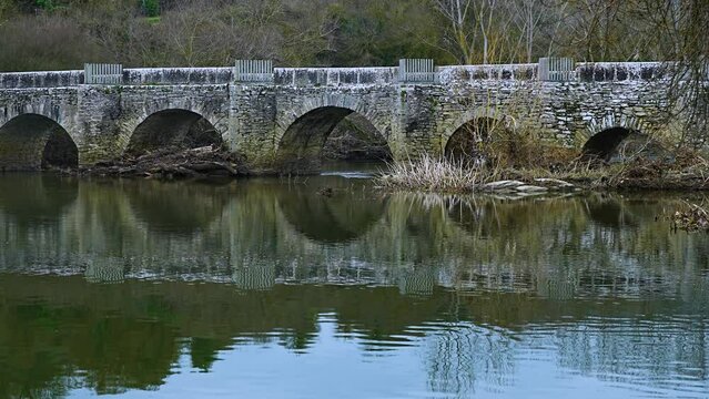 Roman bridge with 13 arches on the river Zadorra in Trespuentes. Municipality of Iruña de Oca. Sierra Badaya. Álava, Basque Country, Spain, Europe