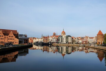 Panorama of Old Town in Gdansk and Motlawa river with ships.