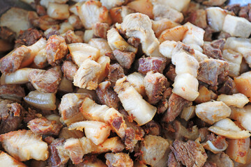The meat pieces piled up after cooking and frying, emitting an attractive taste