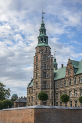 Obraz premium External view of medieval Rosenborg Castle. Rosenborg Castle built by one of most famous Scandinavian kings Christian IV in early XVII century. Copenhagen, Zealand, Denmark.