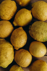 fresh whole lemons close-up. lemons background. fragrant yellow lemons top view. 