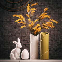 Easter decoration decorated with flowers, vases and figurines
