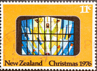 New Zealand - circa 1976: a postage stamp from New Zealand , showing the Resurrection. In a stained...