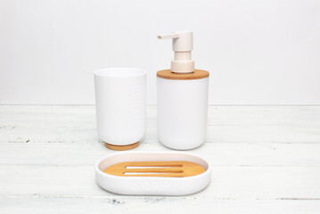 Toiletries and personal hygiene products on white background in bathroom