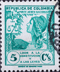 Colombia - circa 1949: a postage stamp from Colombia, showing court scales with Justice. New...