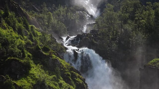 Latefossen Waterfall Odda Norway. Latefoss is a powerful, twin waterfall.