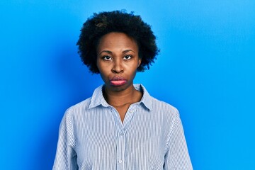 Fototapeta na wymiar Young african american woman wearing casual clothes depressed and worry for distress, crying angry and afraid. sad expression.