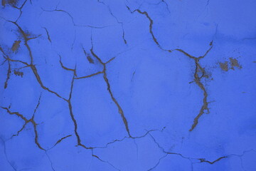 Cracks on a blue wall