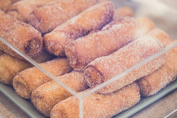 Sweet catalan typical pastry filled with cream (xuixo)