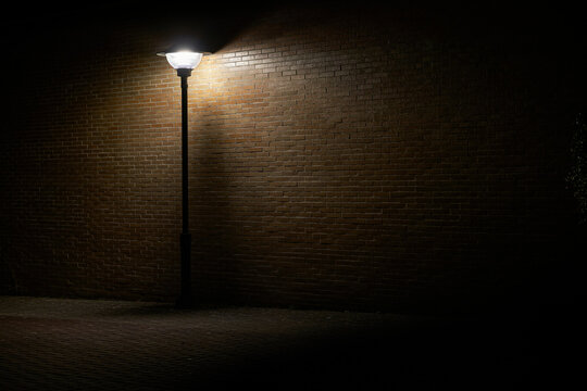 Beautiful And Dark Lonely Street Lamp Illuminating Dark Place At Night  Stock Photo | Adobe Stock