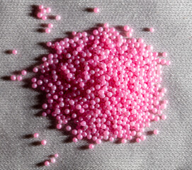 Small sweet pink balloons as a background.