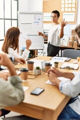 Group of business workers listening boss conference during meeting at the office.