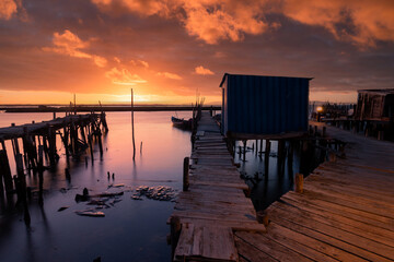 Long exposure seascape at sunset. Palafitic Pier in Carrasqueira. Comporta. Portugal