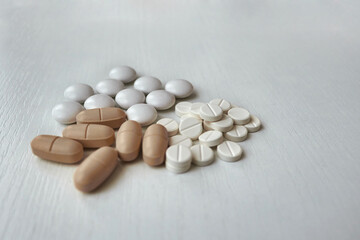 medicine capsules and pills different colours vitamin