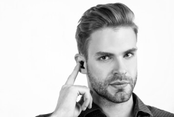 bluetooth headset device accessory. new technology. successful unshaven guy. agile business.