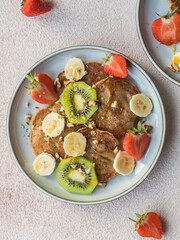 pancakes with kiwi, banana and strawberries