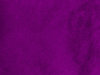 Purple velvet fabric texture used as background. Empty purple fabric background of soft and smooth textile material. There is space for text..